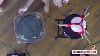 4 girls play a game of strip pop the balloon