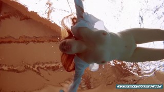 Lola enjoys showing her sexy boobs